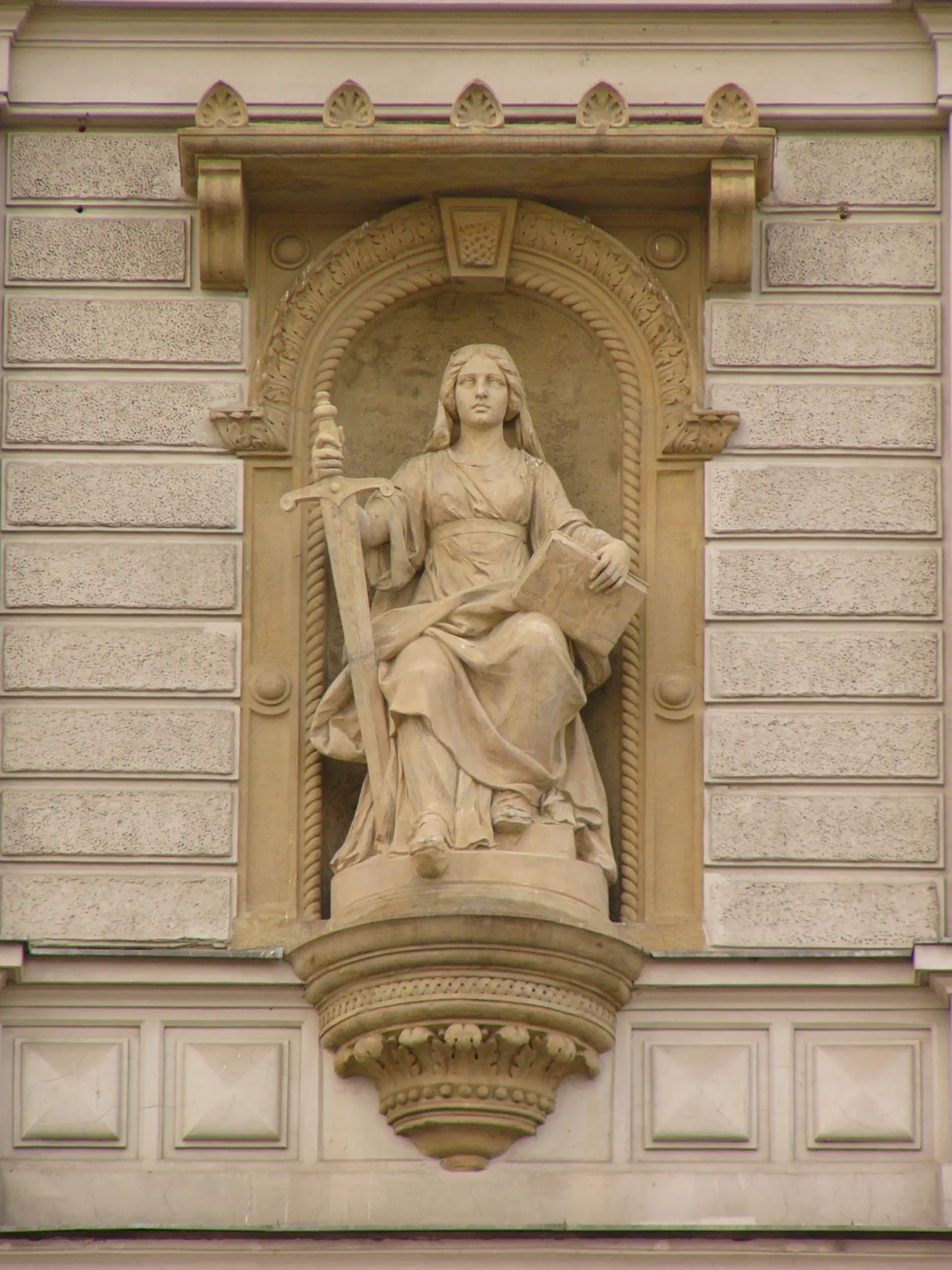 Een beeld van Vrouwe Justitia met weegschaal (ter illustratie)
